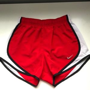 Red athletic Nike shorts